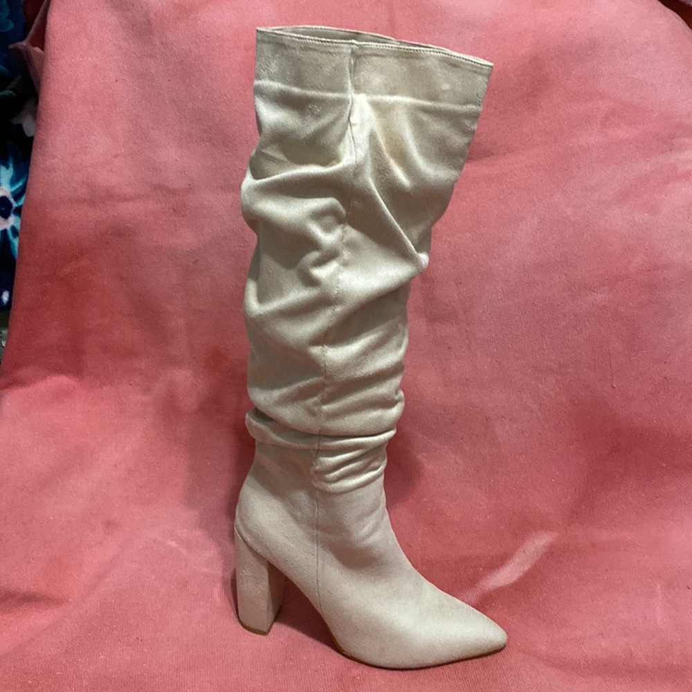 Tall heeled boots